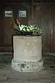 Norman baptismal font in St Denys' parish church