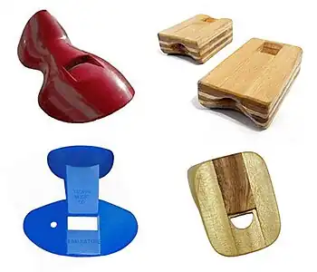 Wooden and plastic manufactured nose whistle