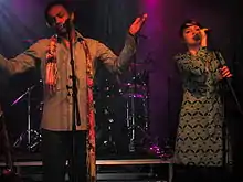 Toto singing with Nouvelle Vague at Le Grand Rex theater in Paris in 2007