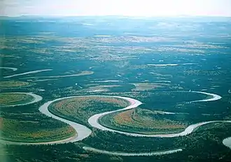 Image 30The Nowitna River in Alaska. Two oxbow lakes – a short one at the bottom of the picture and a longer, more curved one at the middle-right. (from Lake)