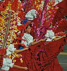 Salvadoran women wear distinctive regional veils for national celebrations.