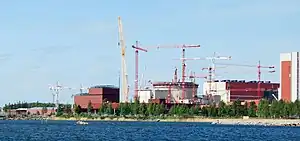 Image 15Olkiluoto 3 under construction in 2009. It was the first EPR, a modernized PWR design, to start construction.  (from Nuclear power)