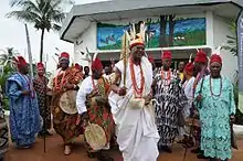 Photo of the current Obi of Onitsha; His Royal Majesty, Igwe Alfred Achebe in his white regalia.