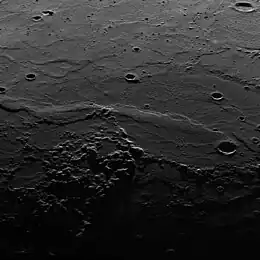 The prominent wrinkle ridge across the center is Schiaparelli Dorsum