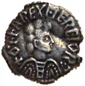 Coin with a man in profile surrounded by lettering reading OFFAREXMERCIOR