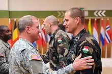 The Ohio Adjutant General awards the Ohio Commendation Medal to Hungary soldiers