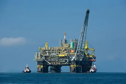 Image 12Semi-submersiblePhoto: Agência BrasilThe semi-submersible oil platform P-51, operated by Brazilian energy company Petrobras, being positioned by tugboats. Semisubs sit on pontoons located under the ocean surface, with the operating deck atop columns, above the sea level. In this manner, they are relatively protected from wave action.More selected pictures