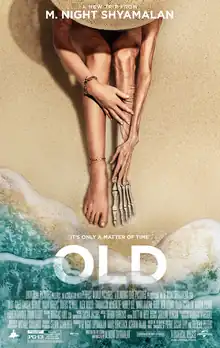 "Theatrical release poster": A young woman at the beach, sitting close to the shore, touches her wrinkly left leg, peeling off the skin to reveal a decomposing skeleton. Underneath her is the tagline: "It's only a matter of time".