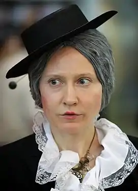 Old lady Shapoklyak played by an actress