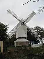 Post mill with roundhouse.