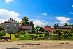 Pond and houses in the centre of Olešná