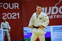 Akil Gjakova (white) participates in the Austrian Ersten Judo-Bundesliga 2021