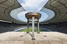 Traditional Olympic cauldrons often employ a simple bowl-on-pedestal design, such as the cauldron used for the 1936 Summer Olympics