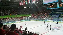 Arena interior and in-game Olympic hockey action