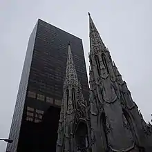 View up Fifth Avenue with Olympic Tower behind St. Patrick's Cathedral