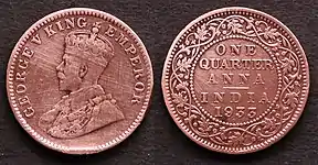 1933 One Quarter anna featuring George V on obverse and face value, country and year on reverse.