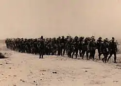 Headquarters Company crossing at Grave di Papadopoli on the afternoon of 31 October 1918. Courtesy National Archives.