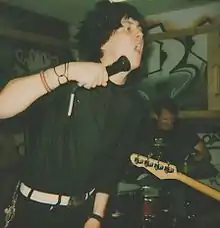 Jayson Green (front) and Jeffrey Salane (back) performing in Bloomington, Indiana in 2000.