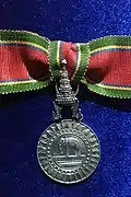 Gold Medal (6th Class) of Order of the White Elephant, female version