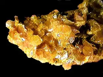 A sample of orpiment from an arsenic mine in southern Russia. Orpiment has been used to make orange pigment since ancient times in ancient Egypt, Europe and China. Romans used the mineral for trade.