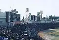 Scoreboard and backstand from the left field in 1989.