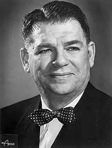 Studio photo of a smiling Oscar Hammerstein