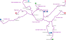 In the middle is a purple circle, with several branches sticking out. One line runs north, one line runs to the north-east and one line runs to the north-west. One line runs to the east that branches into three, two heading south and one east, and the final line runs west, with a short stretch branching off running above a short while.