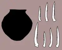 Image 6Carved catfish bones, and jar discovered in Maadi (from Prehistoric Egypt)