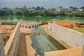 Otamiri River showing the drainage system through which effluent is discharged into the river.