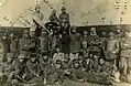 Ottoman pilots in front of a Blériot XI-2 monoplane in 1915, with Ahmet Ali Çelikten next to the propeller, during WWI