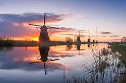 A view of Kinderdijk at sunrise