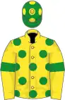 Yellow, green spots and armlets, green cap, yellow spots