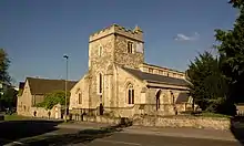 St Cross Church to the south of the junction with St Cross Road.