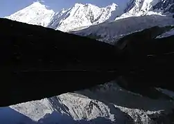 Reflection of Diran (left, 7,266m) and Rakaposhi (right, 7,788m, peak not visible) from Tagafari base camp