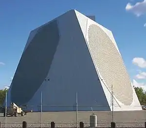 US Air Force PAVE PAWS phased array 420–450 MHz radar antenna for ballistic missile detection, Alaska.  The two circular arrays are each composed of 2677 crossed dipole antennas.