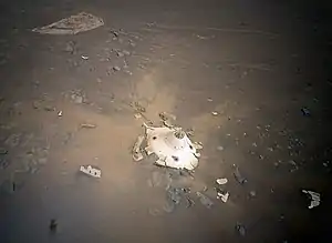 Image 13Perseverance's backshell sitting upright on the surface of Jezero Crater (from Space debris)