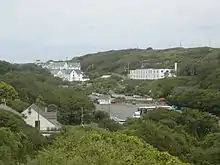 Porthcurno Valley looking north showing the car park and a few of the former Engineering College buildings