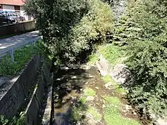 Wilkówka River in front of school