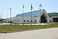 PONY Headquarters with Flag Plaza in view in foreground