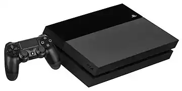 A PlayStation 4 console and DualShock 4 controller