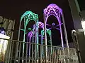 The towers of the Pacific Science Center at night.