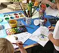 Painting butterflies on an Open Day