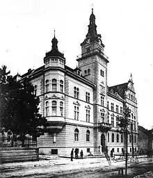 Dated black and white photograph of the Administrative Palace at the round of the 20th century, when Suceava was still under imperial Austrian administration