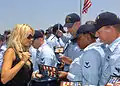 Image 31Playmate of the Year and People for the Ethical Treatment of Animals spokesperson Pamela Anderson, signing DVDs at the USS Halsey