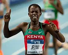 Pamela Jelimo celebrating her win after finishing the 800 metres.