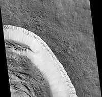 Pangboche Crater, as seen by HiRISE. Pangboche Crater is a very young 11 km diameter crater near the summit of Olympus Mons. Notice the steep walls.