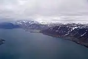 The town and airport snuggled in beside the mountains