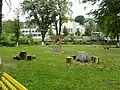 City park in Momin Prohod. The cultural community centre is in the background