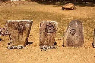 Faces drawn on stones