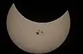 San Jose, California, 21:26 UTC. The eclipse coincided with giant sunspot region 2192, the largest seen in 24 years.